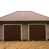 Garaż z płyt z dwoma bramami i kopertowym dachem trapezowym
